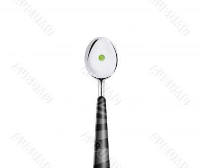 spoon with green peas