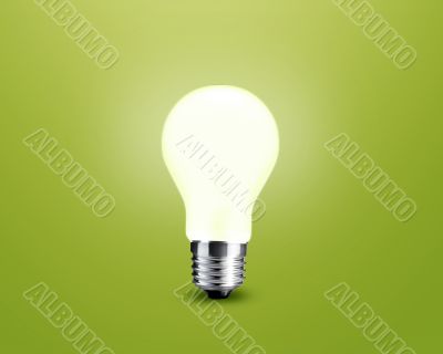 glowing Light bulb idea on green background