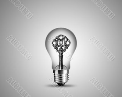 Old key in light bulb