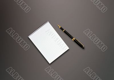 a pen and blank paper on the table 