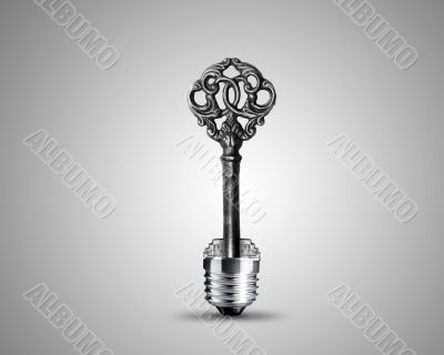 Old key in light bulb
