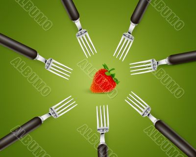 one strawberry between set of forks