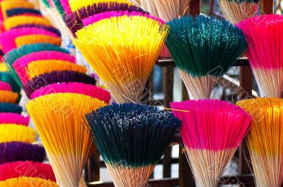 Colorful incense or joss sticks for buddhist prayers