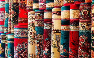 Persian blankets at a market