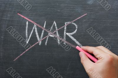 War - word crossed out with red chalk 