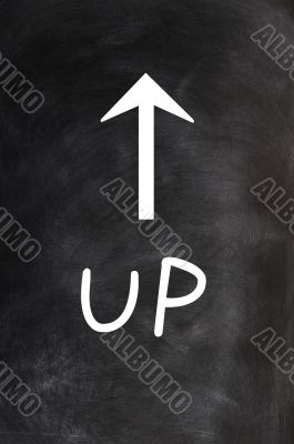 Up - word written on a blackboard with an arrow