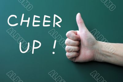 Cheer up written on a blackboard background