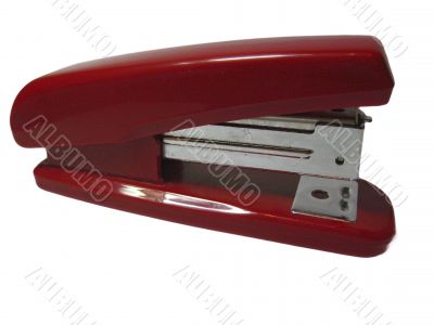 Red stepler isolated on the white background
