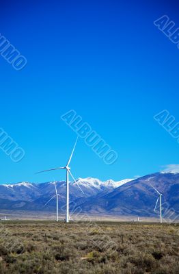 Power mills field in front of the mountain range