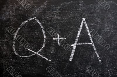 Question and Answer symbols on a blackboard