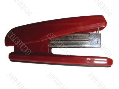 Red stepler isolated on the white background