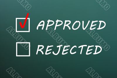 Check boxes for approved and rejected on a green chalkboard 