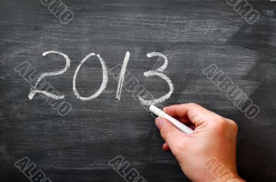 2013 written with chalk on a smudged blackboard