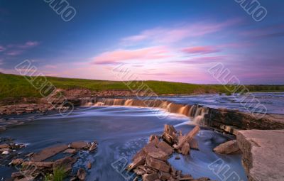 Waterfall in sunset light