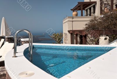 Swimming pool above Santorini Caldera