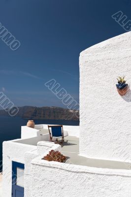 Whitewashed building and the island