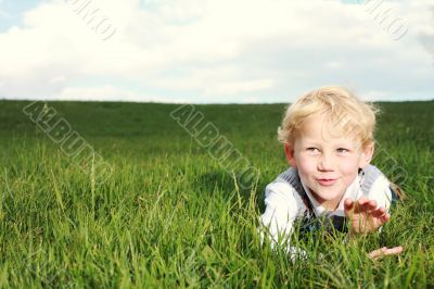 Happy little boy showing appreciation