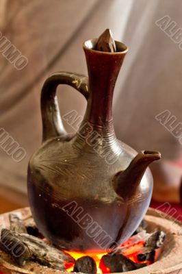 Brewing coffee with Jebena using coal 