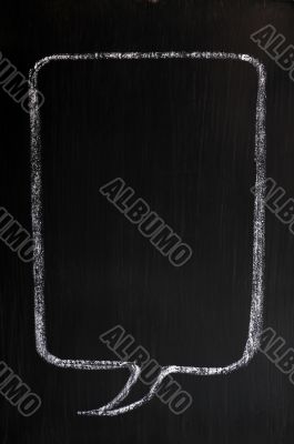 Blank speech bubble drawn on a smudged blackboard