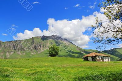 Old house in Caucasus mountains