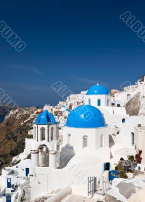 Famous Santorini churches vertical