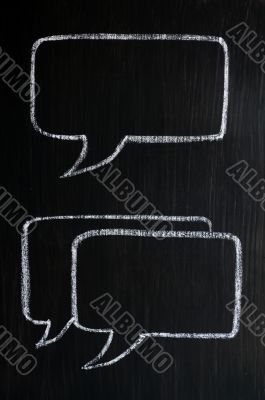 Chalk drawing of speech bubbles