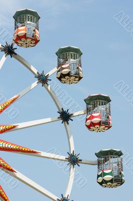 Ferris wheel against blue sky