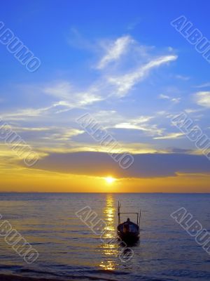 Pattaya sunset with boat.