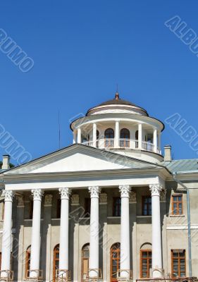 Estate`s front gate with tower 