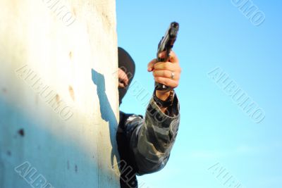 terrorist with mask and gun