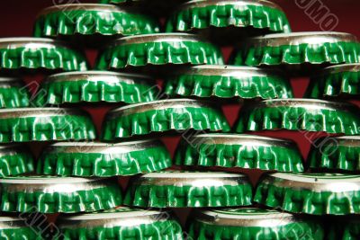 pile of green beer caps