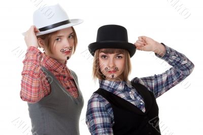 Two girls with painted mustaches