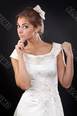Beautiful girl in a white wedding dress