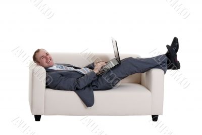 businessman lying on the couch