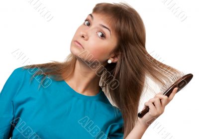 young beautiful girl is combed