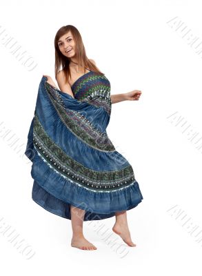 beautiful girl in jeans sarafan dancing