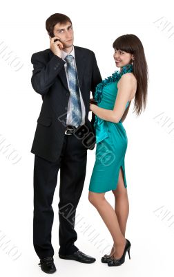 businessman and pretty girl in blue dress