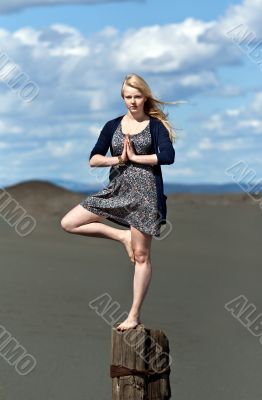 yoga girl standing on one leg