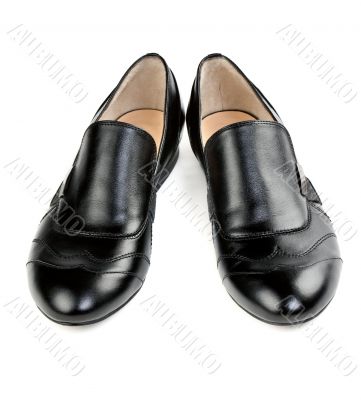 a pair of stylish classic black shoes