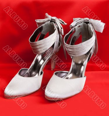 Pair of white women`s shoes