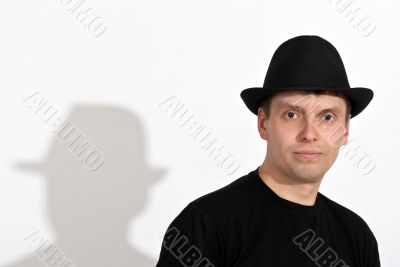 man in a black hat