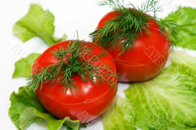 two stuffed tomatoes