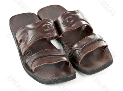 a pair of leather slippers for men