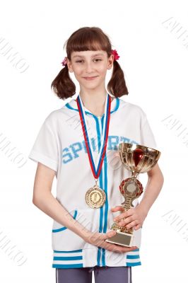 Girl with a medal and a gold cup