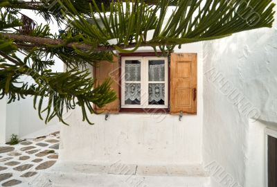 Ochre shutters of the window