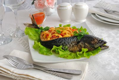 The fish, stuffed with vegetables and cheese