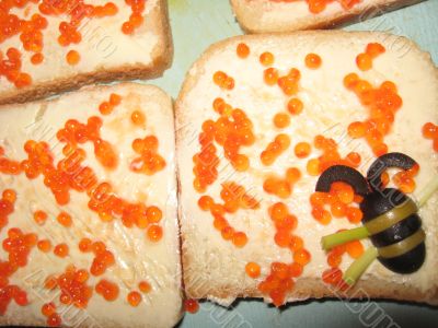 Sandwiches with red caviar