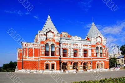 Landscape with historic theater and blue sky