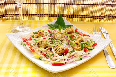 Scrambled eggs with green onions, fresh vegetables and sesame se