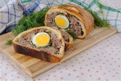 Meatloaf with egg and greens in the test